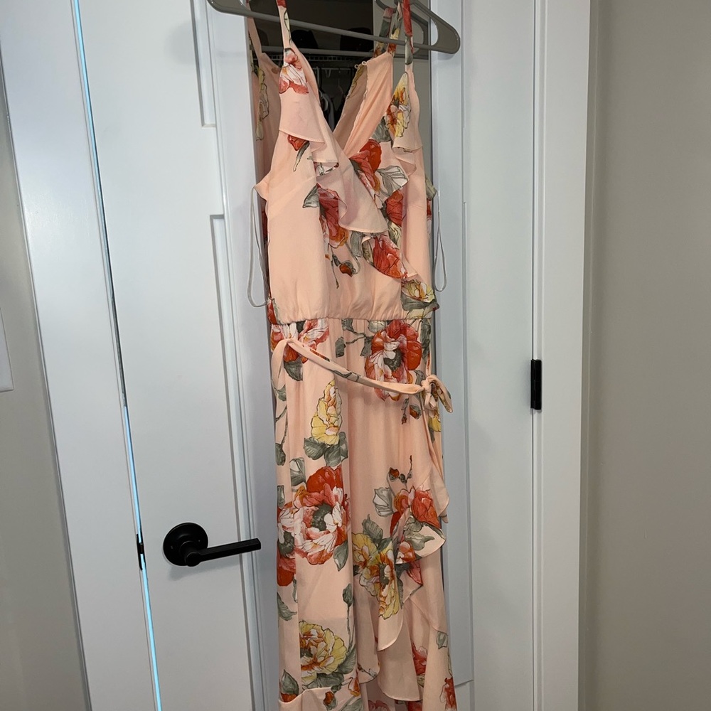 Floral dress with ruffles on chest and down dress.